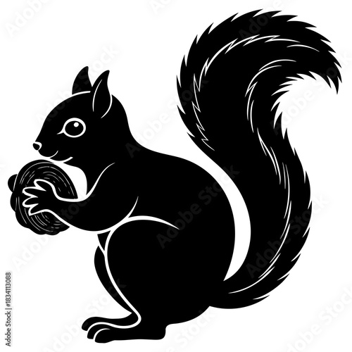 Black silhouette of a squirrel holding a nut with a bushy tail