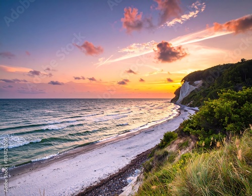 Seascape view of chalk cliffs on the Jasmund Peninsula at sunset, Germany