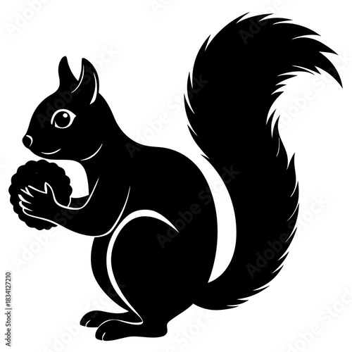 Black silhouette of a cute squirrel holding a nut