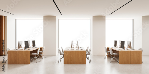 Contemporary office interior with wooden desks and white chairs, computer setups in front of large isolated windows on white background. 3D Rendering