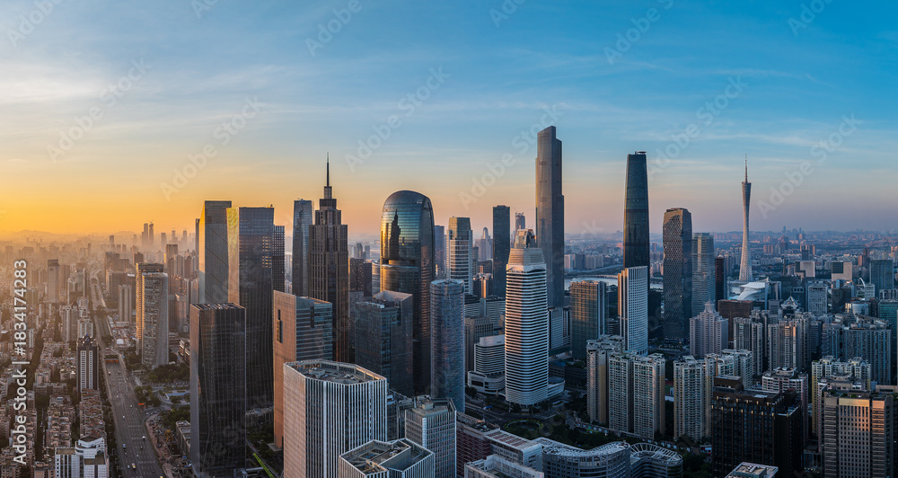 Obraz premium Aerial view of the modern city commercial buildings with skyline at sunrise in Guangzhou