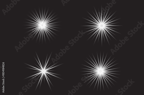 Four radiant starbursts illuminate a dark backdrop with their ethereal glow