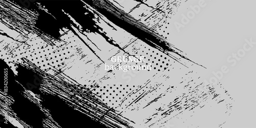 Rough black paint splashes and diagonal strokes creating an edgy contrast on gray.