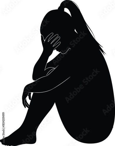 Black Silhouette of a Sad, Depressed, or Stressful Young Woman Sitting Alone with Head in Hands: Mental Health and Negative Emotion Concept.