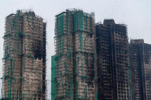 Photography ruins of building after the fatal blaze in Tai Po, Hong Kong, remain of accident