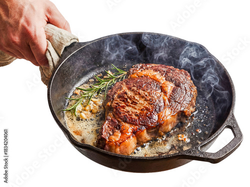 Chef hand holding pan searing ribeye steak isolated white background png transparent cutout cooking beef meat rosemary butter delicious gourmet dinner protein bbq restaurant quality food preparation 