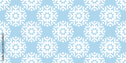 Seamless light blue and white geometric pattern with ornamental snowflake shapes. Elegant winter background for wrapping paper, textile, wallpaper, stationery and modern festive projects. 2