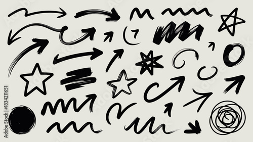 Collection of hand drawn black arrows stars circles and scribbles on light background