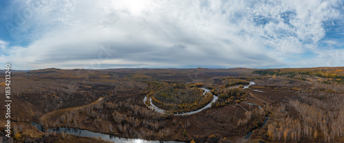 Aerial view of the autumn forests of the Mohe Eighteen Bends Scenic Area in the Greater Khingan Mountains