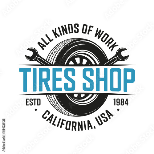 Vintage tires shop emblem with wrench and wheel