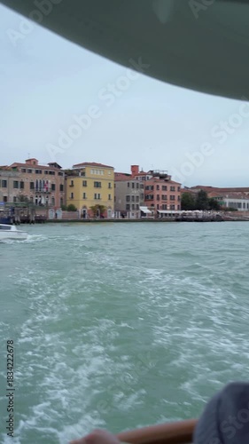 tourists on vaporetto cruising venice canal vertical footage 