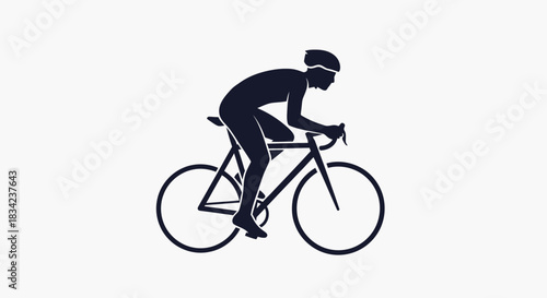 Silhouette of Cyclist Riding Bicycle in Motion Wearing Helmet.