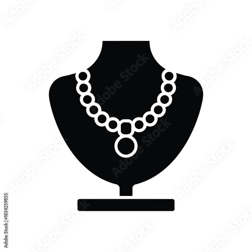 Jewelry display stand silhouette featuring a stylish silver pendant necklace showcase elegant accessory and fashion