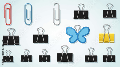 Assortment of colored paper clips and binder clips on a light background