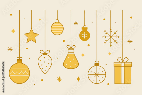 Elegant gold christmas ornaments hanging on strings with gift box