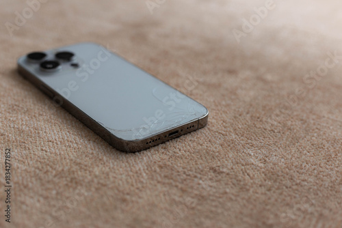 Seller Displays Smartphone With Noticeable Scuff Marks And Textured Background For Reselling Purposes