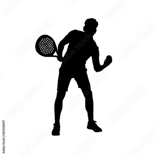 Silhouette of tennis player celebrating a point during a match