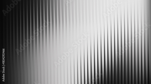 Monochromatic abstract vertical ribbed texture with gradient lighting background