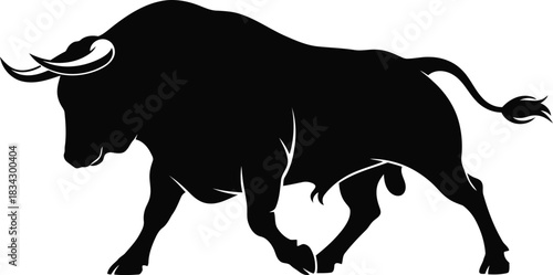 Black bull silhouette charging aggressively