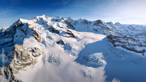 Wallpaper Mural Serene Swiss Alps panorama snow peaks glaciers bathed in soft morning light landscape photography Torontodigital.ca