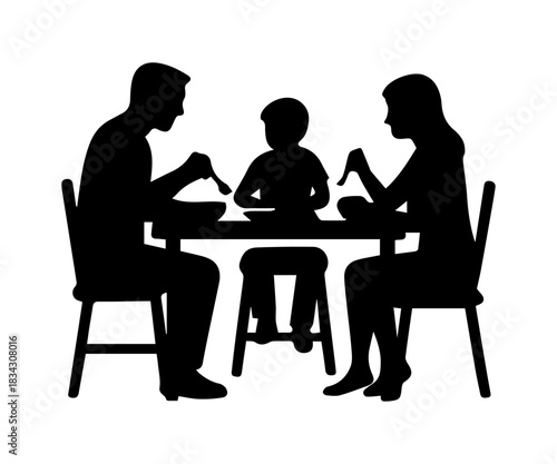 Family eating dinner together at dining table silhouette