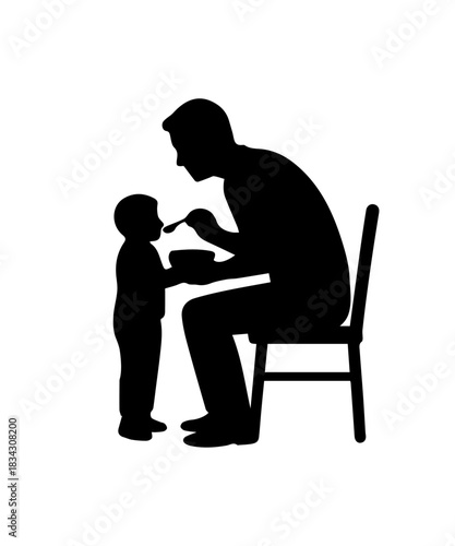 Father feeding baby in high chair silhouette