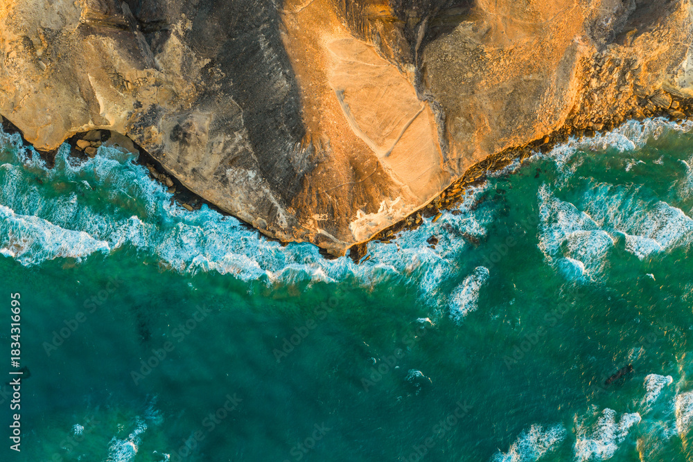 Naklejka premium The Playa Larga is located in the southern part of the Jandía peninsula in Fuerteventura and is a wild and sprawling stretch of coastline, roughly 1.5 kilometers long