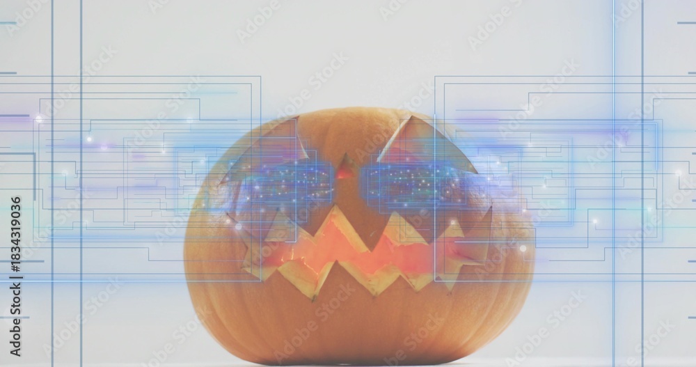 Fototapeta premium Glowing jack-o-lantern on tabletop, displaying triangular eyes zigzag mouth and blue HUD overlays