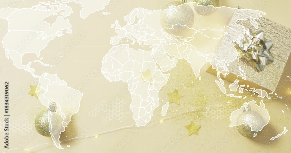 Obraz premium Sitting wrapped giftbox silverbow right on pale gold table, with ornaments, lights, map, copy space