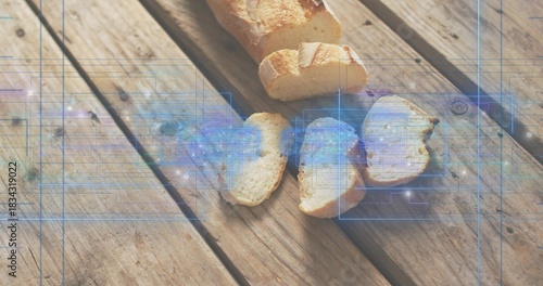 Displaying partially sliced crusty baguette with three slices on picnic table, blue HUD overlay