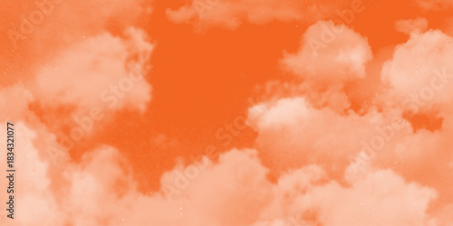 Pink Clouds Against a Warm Orange Sky at Sunrise. fantasy blurred cloudy sky with gradient color and grunge paper texture . White clouds in a sky. Light brown aesthetic. Monochrome cloudscape concept 