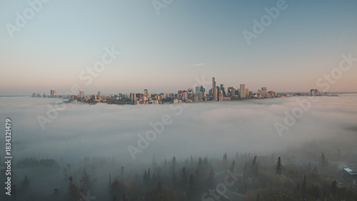 morning fog over the river edmonton alberta skyline sunrise