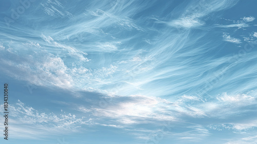 A mesmerizing view of the sky with wispy clouds, creating a sense of tranquility and vastness