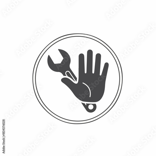 Hand holding wrench inside a circle, representing repair, service, and maintenance