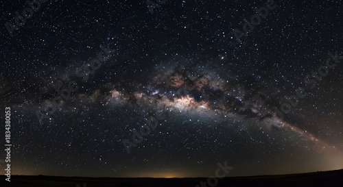 The vast, deep black of a moonless, starry night.