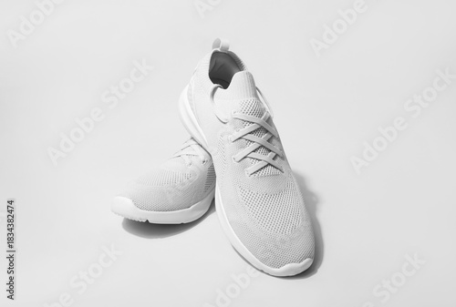 Pink pastel color sneakers on background