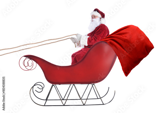 Santa Claus Sitting in his sleigh with a large bag of toys trailing out the bacl of the red sleigh.