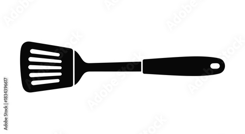 Black and white spatula cooking utensil icon illustration in silhouette style silhouette