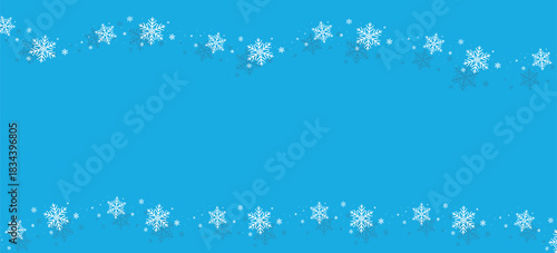 A festive Christmas print design. Hand-drawn snowflake silhouettes. Snowflakes fall against a blue background