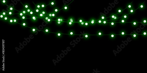 Strings of glowing green decorative lights hanging in swags against a dark black background.