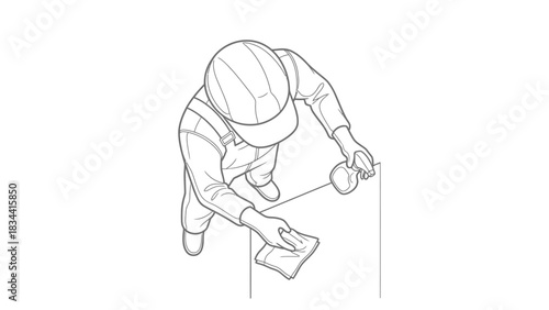 Cleaner in uniform spraying and wiping a surface cleaning