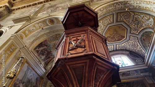 Old wooden pulpit inside a historic church