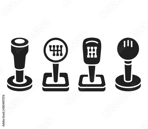 Collection of four distinct manual car gear shift knobs and gear stick icons, isolated on a plain background, representing automotive transmission and driving control.