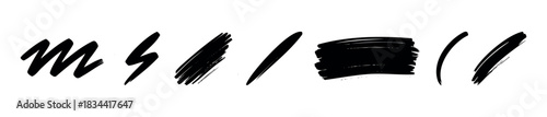 Collection of diverse black brush strokes and scribbles offering visual texture and dynamic accents for graphic applications and expressive backgrounds.
