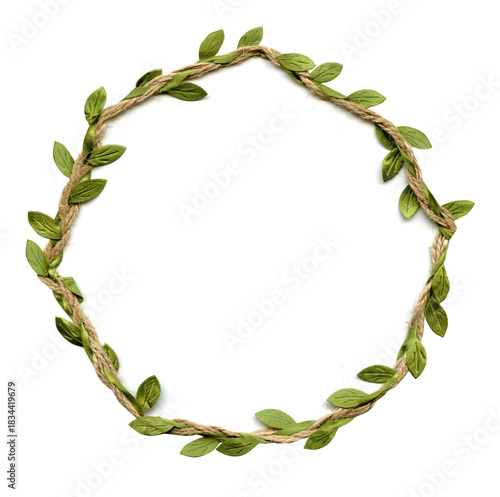 Floral frame for congratulatory text made of jute with green leaves. Round shape