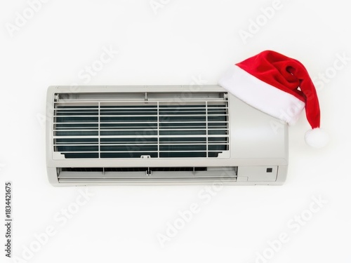 Air conditioner with Santa hat for the holiday season background