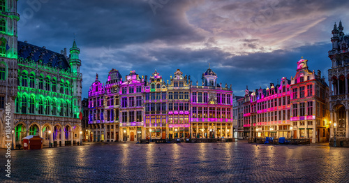 The illuminated buildings at the Grande Place in Brussels, Belgium, during a sunrise in the festive Christmas season without people
