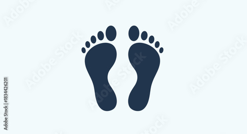 Minimalist icon of dark blue human footprints on a light blue background, representing concepts like walking, travel, or a carbon footprint.