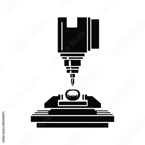 Black silhouette of a C N C machine working on a round object manufacturing industry