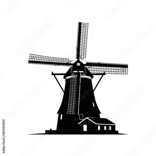 Silhouette of a traditional dutch windmill with four blades rotating isolated on white background